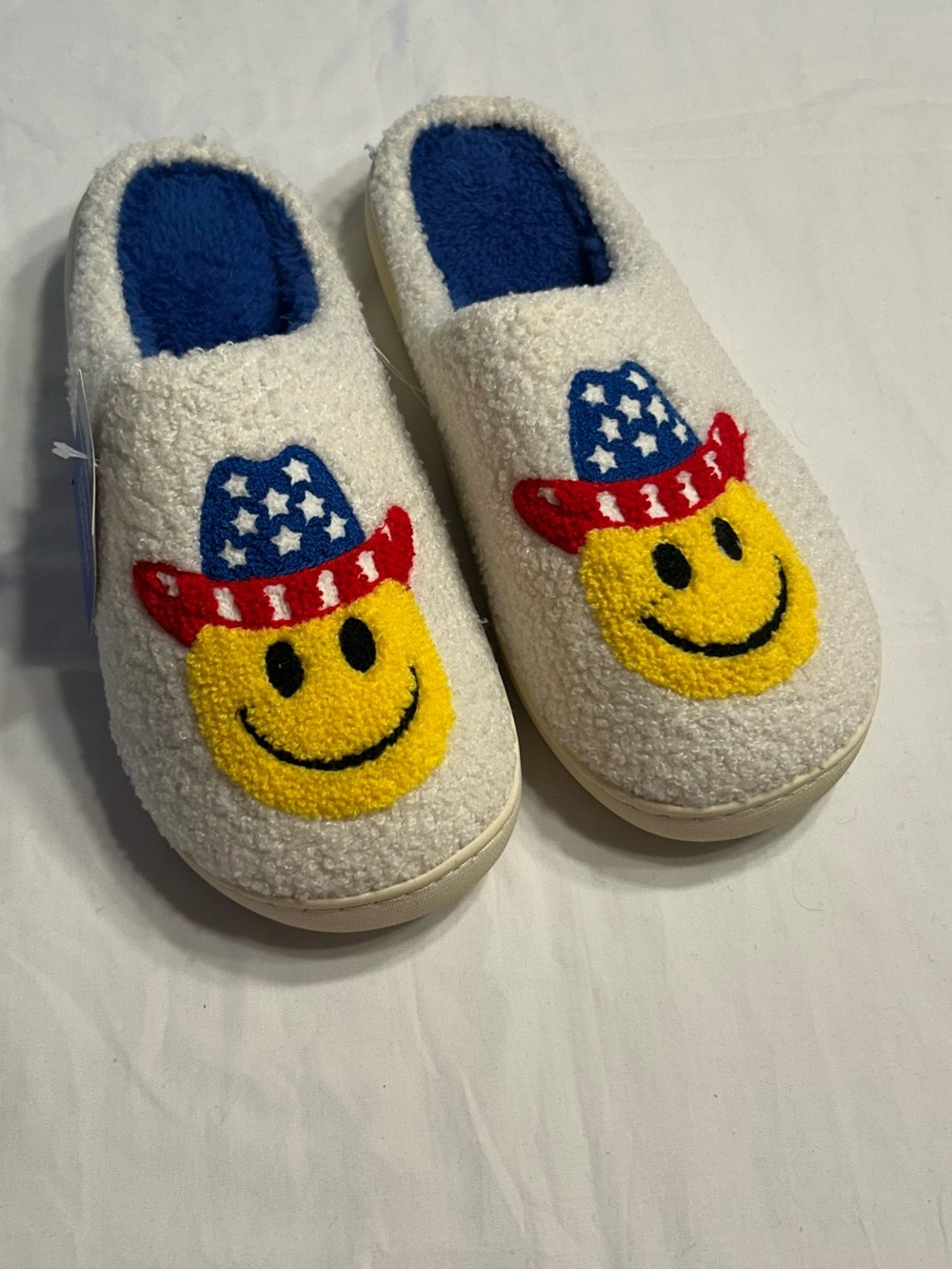 NWT Smiley face cowboy slippers. Size 9-10